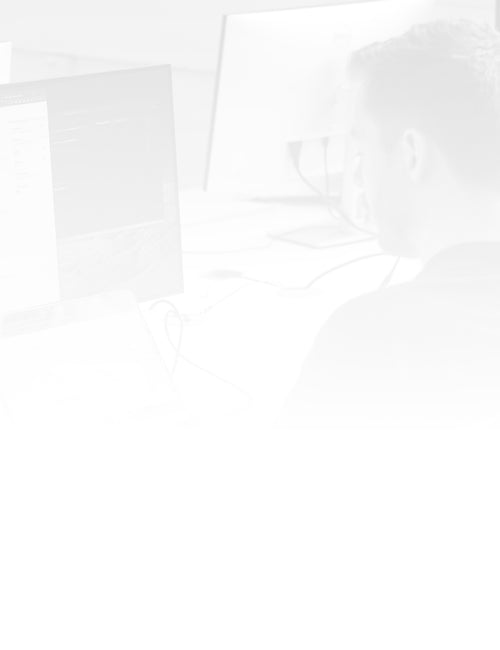 A semi-transparent image of our developers building a Shopify website.