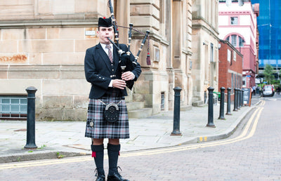 A bagpiper.
