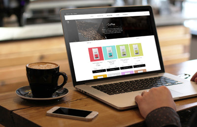 Someone exploring a coffee collection page on the Machina desktop website.