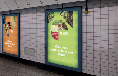 Glasgow National Park City banners in a subway station.