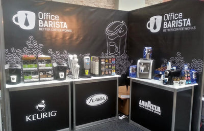 An Office Barista stand with coffee pods and machines.
