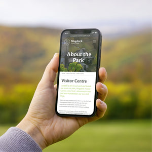 Someone viewing the mobile website of Mugdock country park.